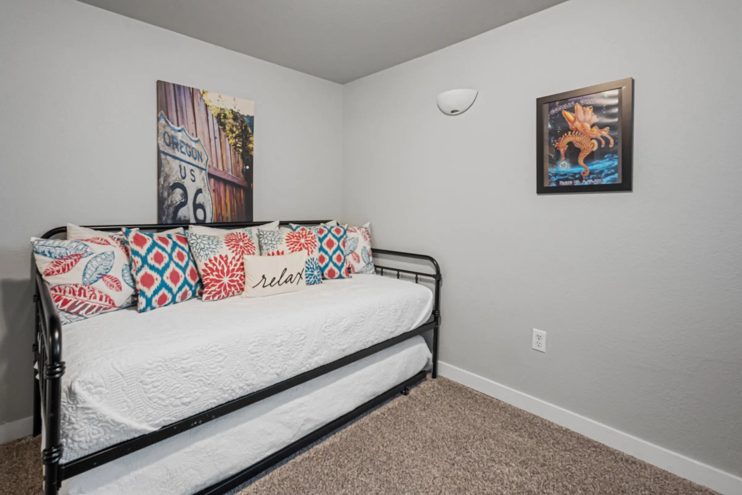 Daybed with trundle providing two extra twin beds in the lower level of Magnolia House, Bend
