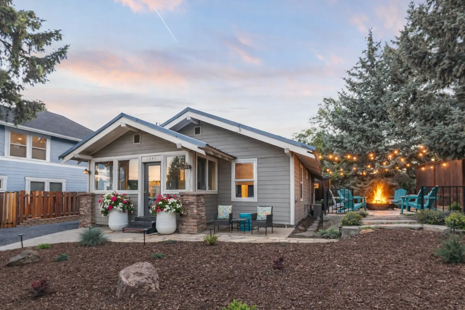 Front exterior of Magnolia House vacation rental at twilight in Bend’s River West neighborhood